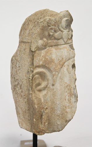 Lot 87 - A Chinese stone fragmentary head of a Buddhist deity, Tang style