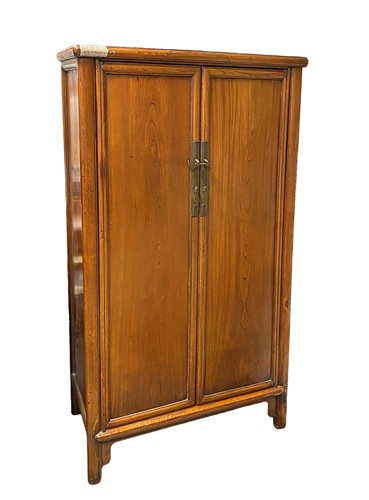 Lot 369 - A Chinese Ming style wardrobe, 20th century,...