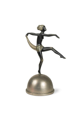 Lot 113 - After Josef Lorenzl, a patinated and silvered spelter model of a scarf dancer