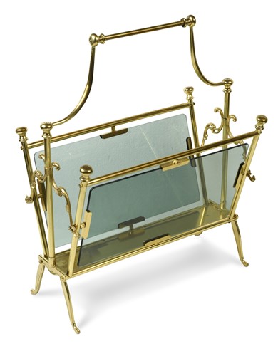 Lot 220 - A 1970s brass and glass magazine rack