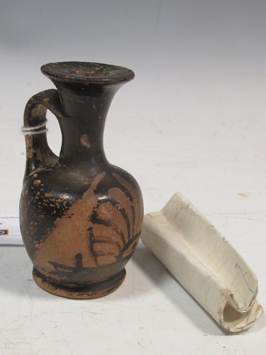 Lot 136 - A small ancient Greek vase, 8cm high...