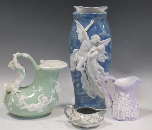Lot 23 - A 19th century relief moulded purple ground...