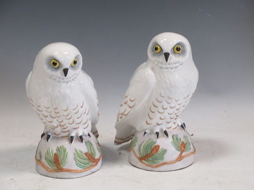 Lot 111 - A pair of Crown Staffordshire models of Snowy...