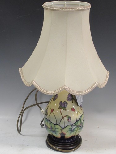Lot 108 - A modern Moorcroft table lamp and shade, 28cm...