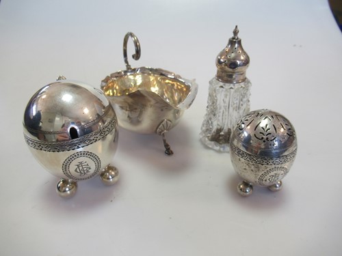 Lot 260 - A silver mustard, a similar pepper caster, a...