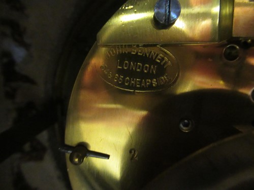 Lot 19 - An early 20th oak cased mantle clock retailed...