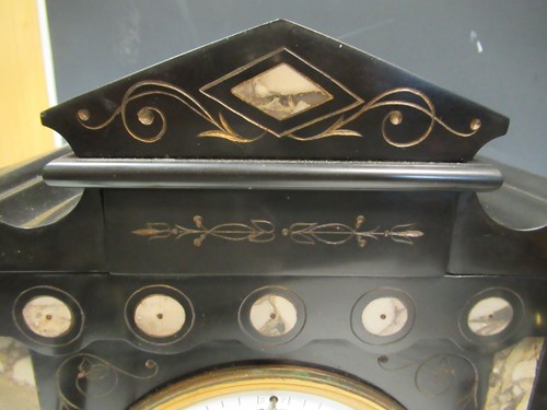 Lot 19 - An early 20th oak cased mantle clock retailed...