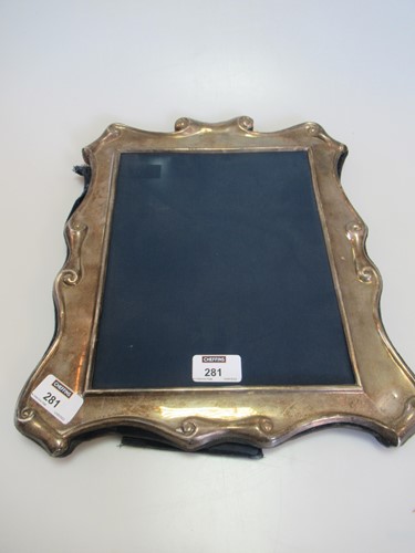 Lot 281 - A silver fronted photograph frame, aperture...