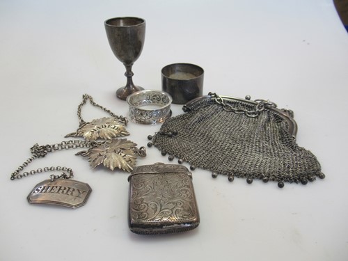 Lot 266 - A silver chain maille coin purse, three silver...