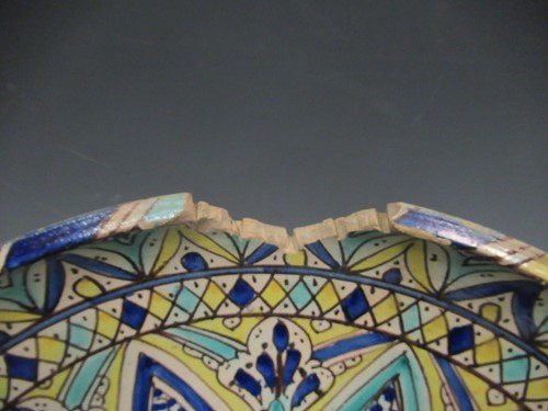 Lot 36 - Three Moroccan plates, each decorated with...