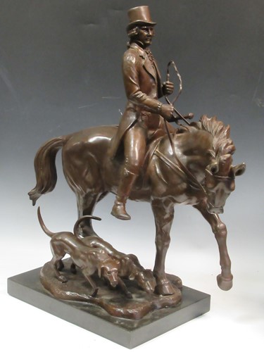 Lot 99 - A large bronze model of a mounted huntsman and...