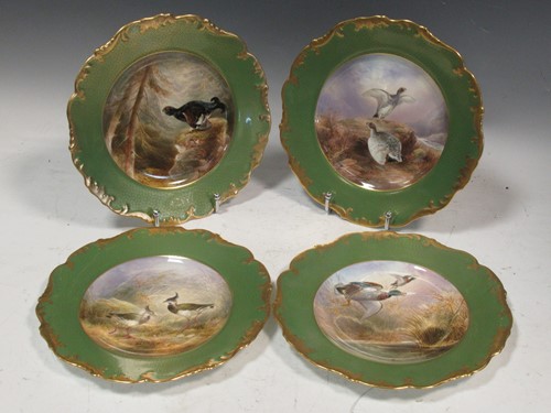 Lot 60 - A set of four Cauldon cabinet plates, painted...