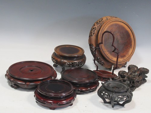 Lot 75 - A large collection of Chinese hardwood stands