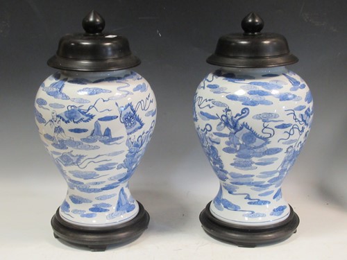 Lot 73 - A pair of blue and white Chinese vases with...