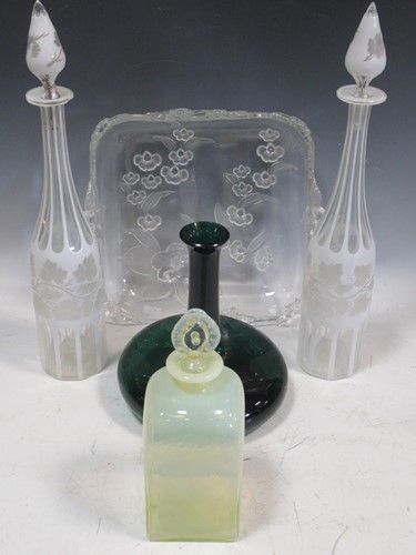 Lot 64 - A pair of white overlay glass decanters and...