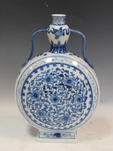 Lot 58 - A Chinese blue and white moon flask with...