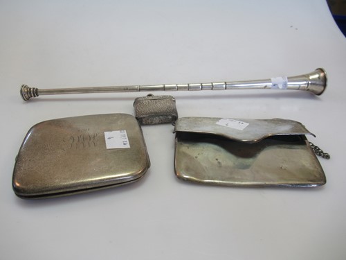 Lot 264 - A silver cigarette case, a silver vesta, a...