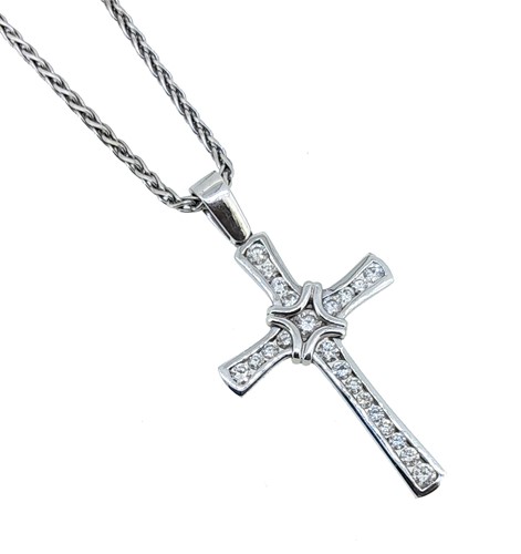Lot 253 - A diamond cross pendant and chain