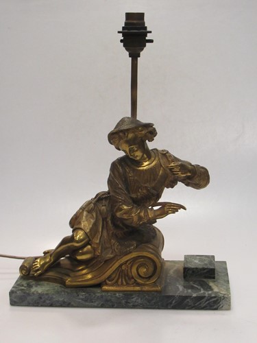 Lot 204 - A gilt metal figural lamp, on a marble base,...