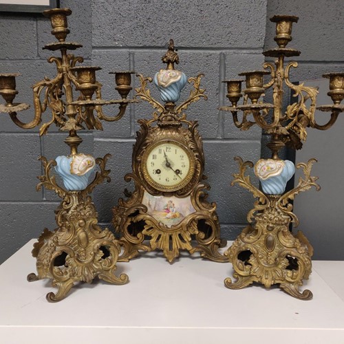 Lot 210 - A 19th century continental gilt and porcelain...