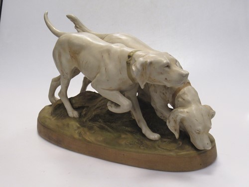 Lot 206 - A Royal Dux model of pointers, 33cm wide