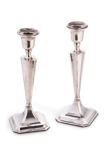Lot 686 - Chester - A pair of George V silver candlesticks