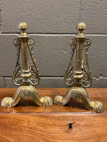 Lot 219 - A pair of brass fire irons, 33cm high