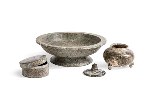 Lot 91 - A Chinese green puddingstone tripod small vase, perhaps Tang Dynasty