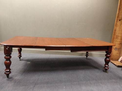Lot 575 - A Victorian mahogany extending dining table...