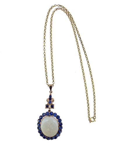 Lot 33 - An opal and sapphire cluster pendant and chain