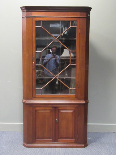 Lot 454 - A Georgian style mahogany barrel back corner...