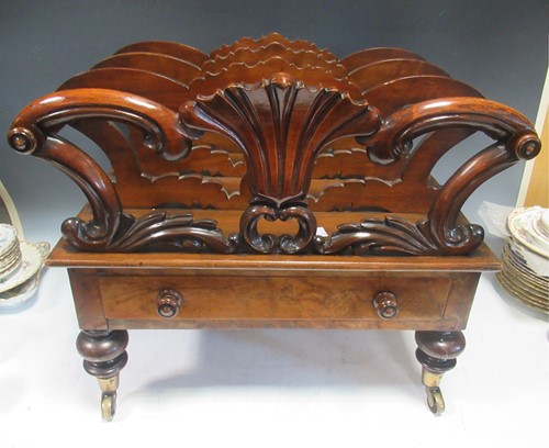 Lot 372 - A William IV walnut canterbury on turned legs...