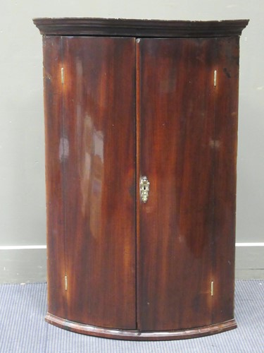 Lot 406 - A 19th century mahogany bow front corner...