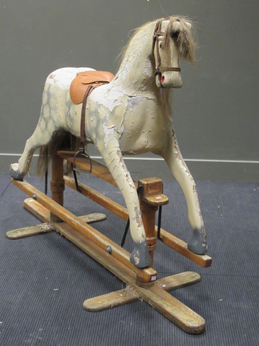Lot 368 - A large painted rocking horse, 119 x 175 x 62cm