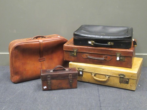 Lot 533 - Four leather suitcases, a pigskin case with a...