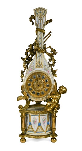 Lot 526 - A French porcelain and ormolu mantel clock, 19th century