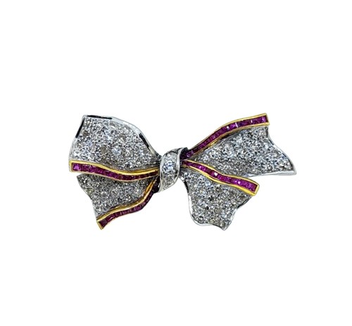 Lot 217 - A ruby and diamond bow brooch