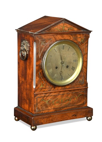 Lot 134 - A 19th century mahogany and brass inlaid mantel clock