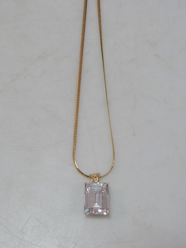 Lot 148 - A cubic zirconia pendant hallmarked 14ct gold,...