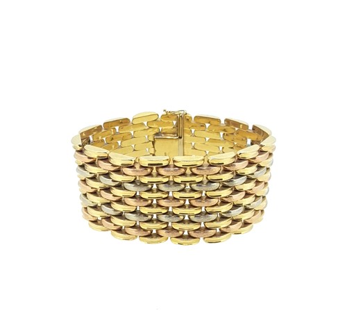 Lot 212 - A three colour cuff style bracelet