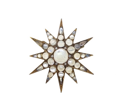 Lot 7 - A Victorian moonstone star brooch