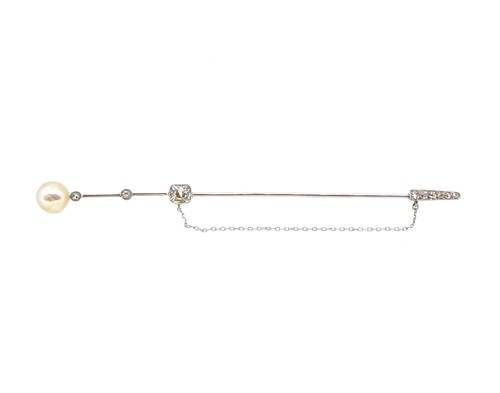 Lot 199 - A natural saltwater pearl and diamond stick pin