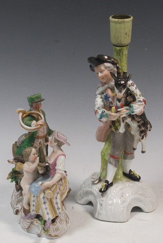 Lot 231 - A Stitzendorf figure group of a man with a...