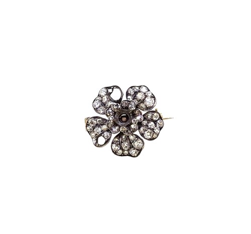 Lot 127 - A Victorian diamond set flower brooch