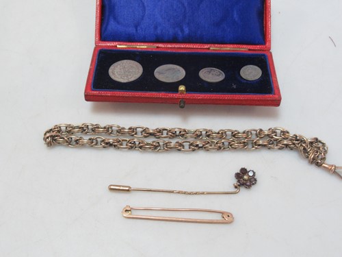 Lot 156 - A watch chain tested as 9ct gold, a floral pin...