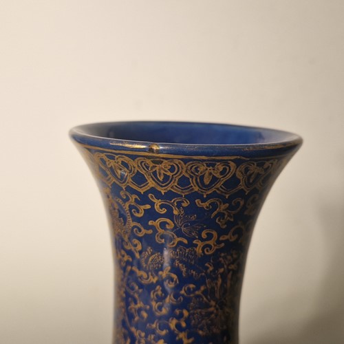 Lot 52 - A Chinese blue monochrome and gilt bottle vase, Qing Dynasty, 19th century
