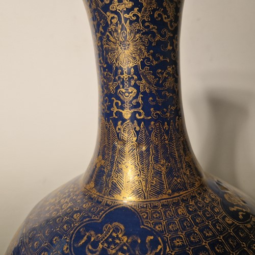 Lot 52 - A Chinese blue monochrome and gilt bottle vase, Qing Dynasty, 19th century