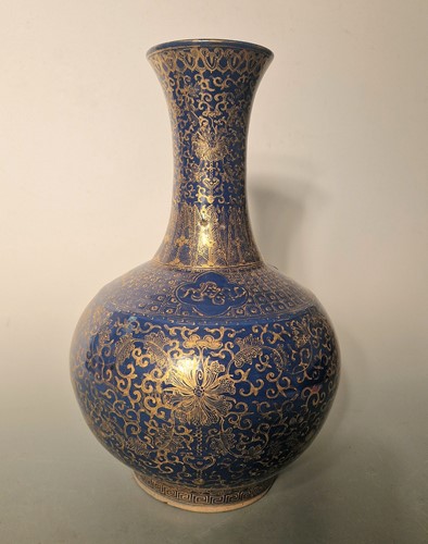 Lot 52 - A Chinese blue monochrome and gilt bottle vase, Qing Dynasty, 19th century