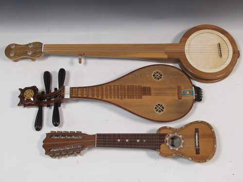 Lot 90 - A Chinese lute or Liuqin; armadillo skin...