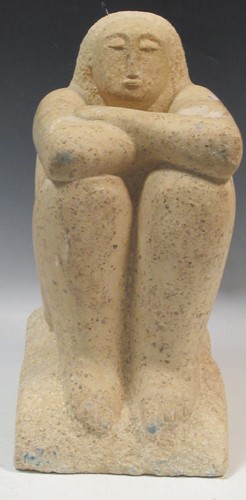 Lot 105 - A 20th century carved stone female figure...